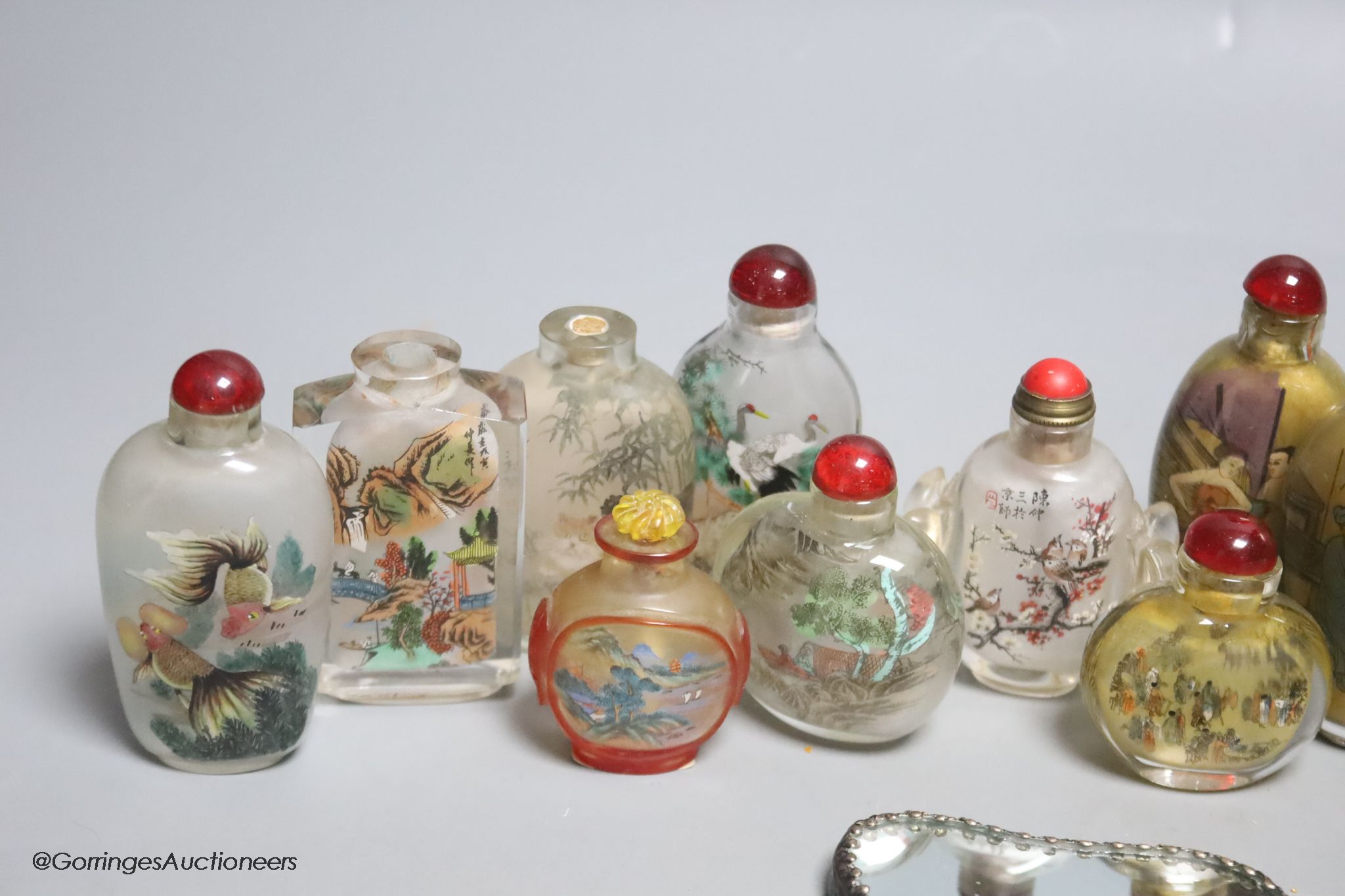 Fifteen Chinese glass painted snuff bottles